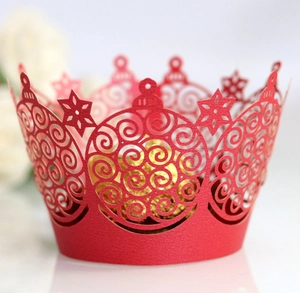 Elegant red laser-cut cupcake wrapper with hollow crown patterns for weddings and parties