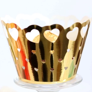 Gold heart-shaped hollow cupcake wrappers with glossy finish for wedding cake decor