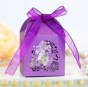 Elegant purple laser cut wedding favor box with ribbon and floral hollow design