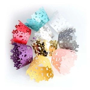Laser cut floral hollow cupcake wrappers in multiple colors for wedding cake decoration