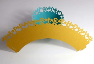 Laser cut Happy Birthday cupcake wrappers in gold glitter and light blue star designs
