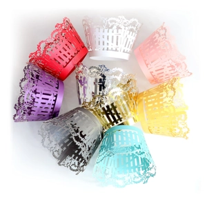 Laser cut floral cupcake wrappers in multiple vibrant colors for dessert decoration
