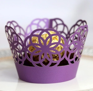 Elegant purple laser-cut cupcake wrapper with floral patterns for wedding party decor