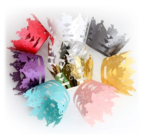 Laser-cut Christmas tree cupcake wrappers in assorted colors for festive party decoration