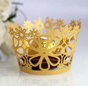 Elegant gold laser-cut hollow flower paper cake wrapper with chocolate for wedding decor