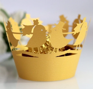 Laser-cut yellow bird pattern cupcake wrappers for elegant wedding dessert decoration