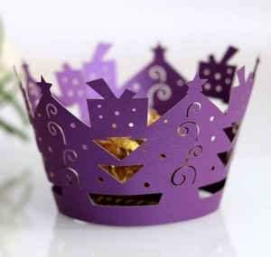 Laser-cut purple Christmas cupcake wrapper with star and gift box hollow patterns