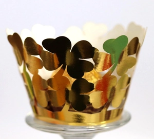 Gold hollow clover cupcake wrapper made of laser-cut mirror foil for wedding party decor