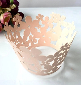 Detailed laser-cut peach floral cupcake wrapper for wedding and birthday party decor