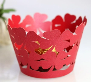 Red four-leaf clover laser cut cupcake wrappers for wedding and party decorations