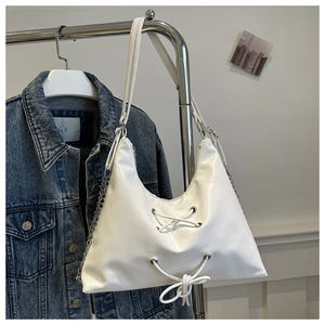 White PU leather underarm bag with silver eyelets and cross lace-up decorative detail