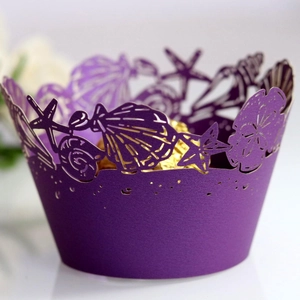 Purple laser cut cupcake wrappers with ocean sea shell and starfish design for parties
