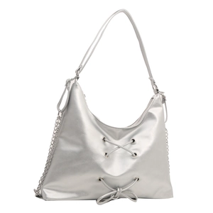 Y2K style silver metallic PU shoulder bag with cross strap design and butterfly bow detail