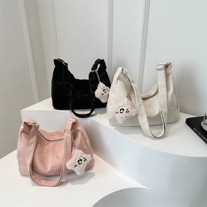 Minimalist crossbody dumpling bag in three colors with cute star plush pendant charms