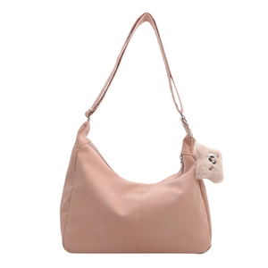 Pink minimalist crescent shoulder bag with cute brown plush bear pendant charm