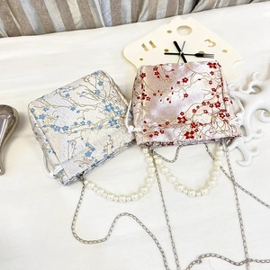 Fashionable floral jacquard bucket bags with pearl handles and silver chain straps