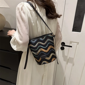 Women's chic plaid bucket bag with colorful wavy knit texture and black shoulder strap
