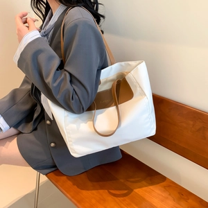 Minimalist white PU tote bag with brown leather patchwork and fashion embossed lettering