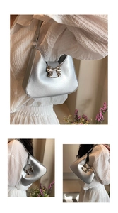 Detailed views of a silver bow-knot handbag with metallic finish and chain strap