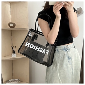 Detail of transparent smoky black tote bag with Fashion print and black inner pouch