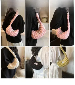 Detailed views of bubble textured cloud bags in pink, white, black, and yellow colors