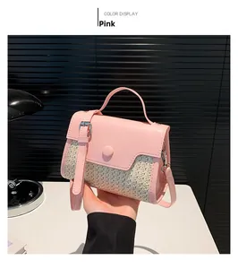 Pink patchwork straw small square bag detail with smooth leather and top handle