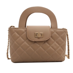 Quilted crossbody bag in brown with gold chain strap and turn-lock closure
