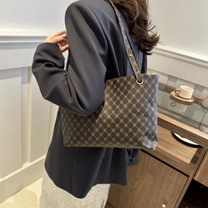 Large capacity tote bag with gold clover print on dark faux leather shoulder bag