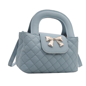 Quilted light blue handbag with bow metal clasp and large capacity design for women