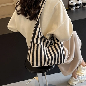 Minimalist black and white striped canvas tote bag with large capacity and side pocket