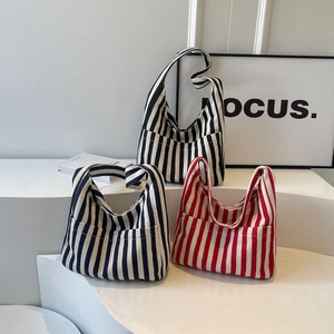 Vertical striped canvas tote bags with front pockets for casual daily commuting use