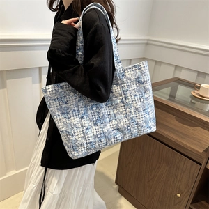 Large blue and white tweed tote bag with woven straps for daily commuting and office use