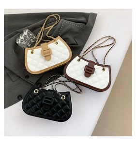 Detailed view of quilted faux leather shoulder bags in black, brown, and beige colors