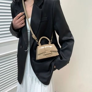 Chic khaki patent leather mini crossbody bag with top handle for a minimalist look