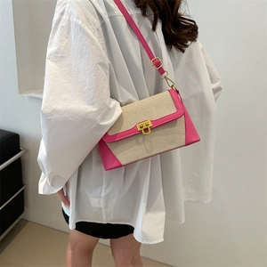 French retro baguette shoulder bag in pink leather and beige canvas with gold clasp