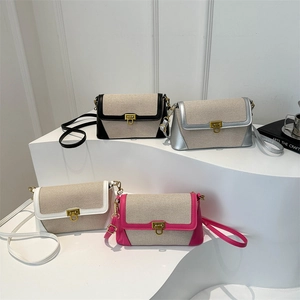 French retro baguette shoulder bag with canvas拼接 leather and U-shaped metal buckle