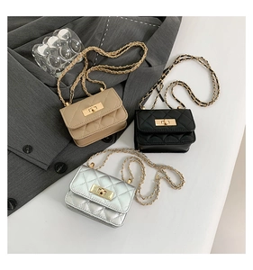 Detailed view of quilted mini chain bags in black, khaki and silver with gold turn-locks