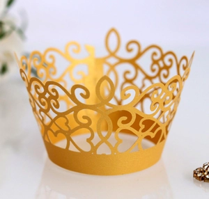Golden lace laser cut cupcake wrappers with hollow vine patterns for wedding party decor