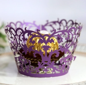Elegant purple laser-cut lace cupcake wrapper with vine patterns for wedding decor
