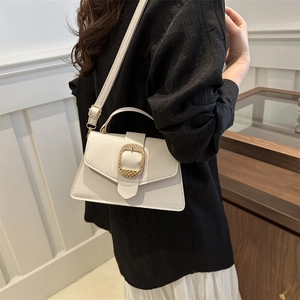 Elegant off-white lychee leather square handbag with golden oval buckle and adjustable strap