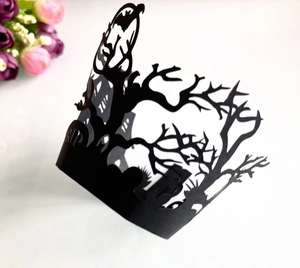 Laser-cut Halloween cupcake wrapper with black spooky cemetery tree and RIP gravestone