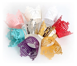 Laser cut birdcage cupcake wrappers in various colors for wedding party decoration