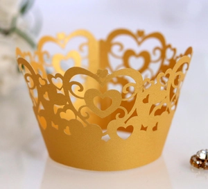 Elegant gold heart laser-cut cupcake wrappers for wedding and party dessert decorations