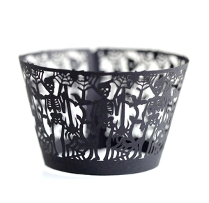 Laser cut black Halloween cupcake wrappers with spider web and skull hollow design