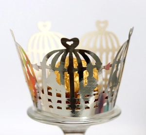 Silver mirror laser-cut cupcake wrapper with birdcage and heart design for weddings