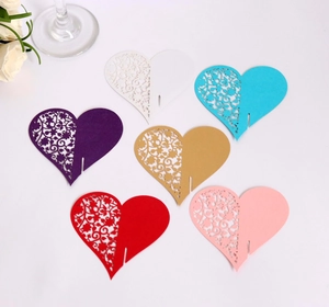 Detailed laser-cut heart place cards in multiple colors for wedding glass decoration