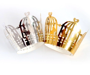 Laser cut birdcage cupcake wrappers in gold and silver with heart and bird detail