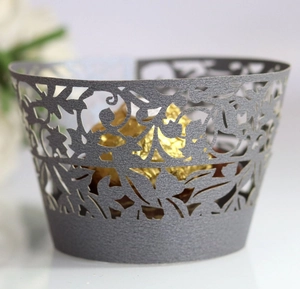 Detailed laser-cut dark grey lace cupcake wrapper with intricate floral patterns