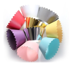 Multi-color hollow wave cupcake wrappers in metallic and matte finishes for decorations
