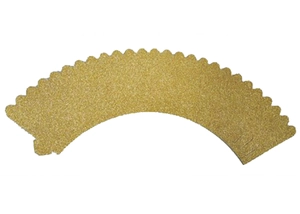 Detail of laser-cut blue wave cupcake wrappers with gold glitter texture and jagged edges